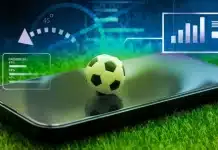 Sporda yapay zeka yatırımları: Ekonomik etki ve büyüme stratejileri Sporda yapay zeka yatırımları kapsamında spor analitiği ve spor teknolojileri dijital dönüşüm verileri gösteren modern stadyum ekranı